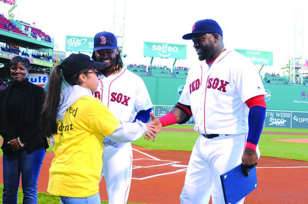 ➥➥ Stephanie Suavita, of the Parlin School in Everett is being congratulated by Hanley Ramirez and “Big Papi” for her academic success.