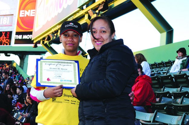 ➥➥ Proud mom at Fenway Park with her daughter Elizabeth Del Rosario from the Browne School in Chelsea who received a recognition for academic success.