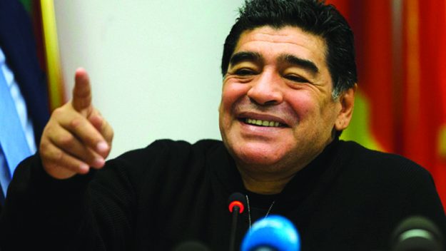 Former Argentine soccer player Maradona attends a news conference in Rome