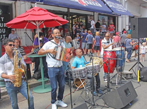 Live Music: Traditional Dominican music on Yawkey Way, courtesy of the Santos Peña band.