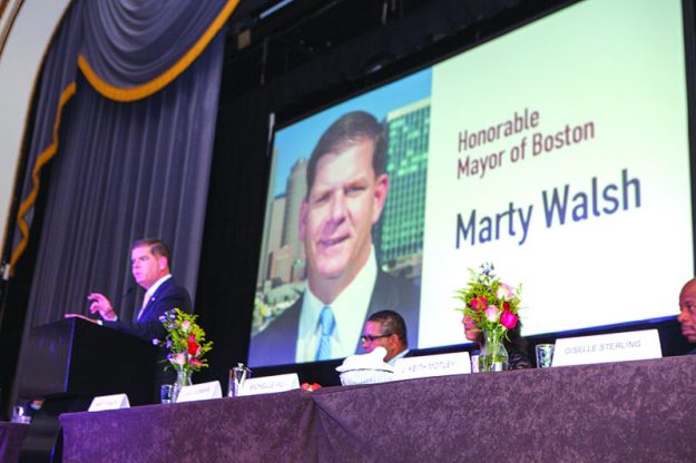 Mayor of Boston Marty J. Walsh having a blast during the El Mundo Hispanic Heritage Breakfast.