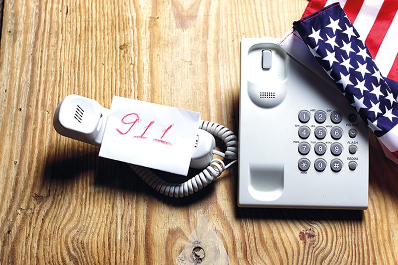 telephone domestic on wooden background concept of 911 number