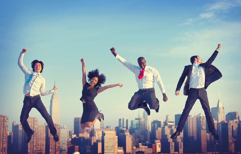 Workers celebrating 4 day work week