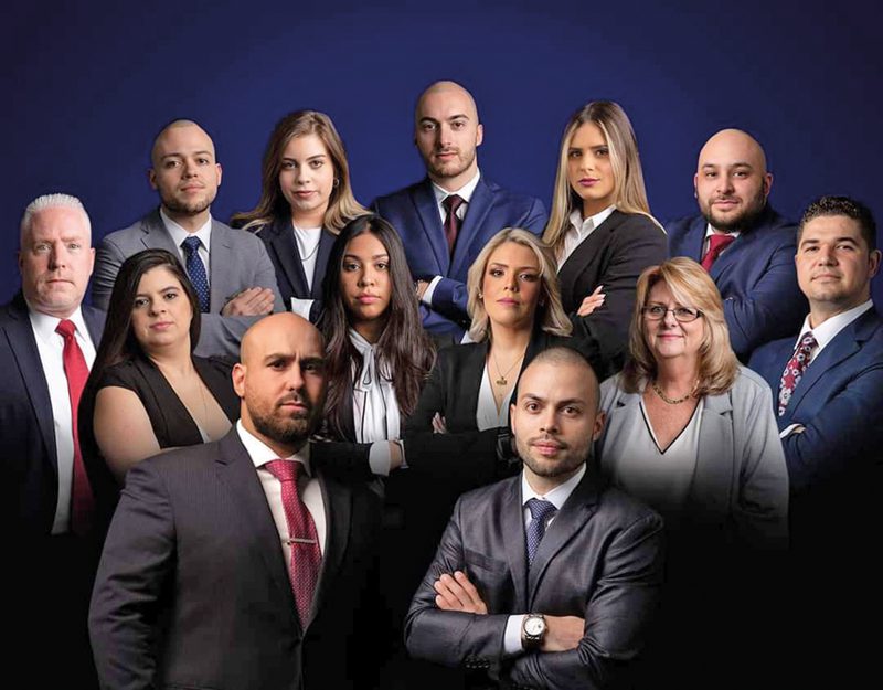 Exitosos: Abogados Andrew George Lattarulo y Audai Cote con equipo legal de George/Cote Law.