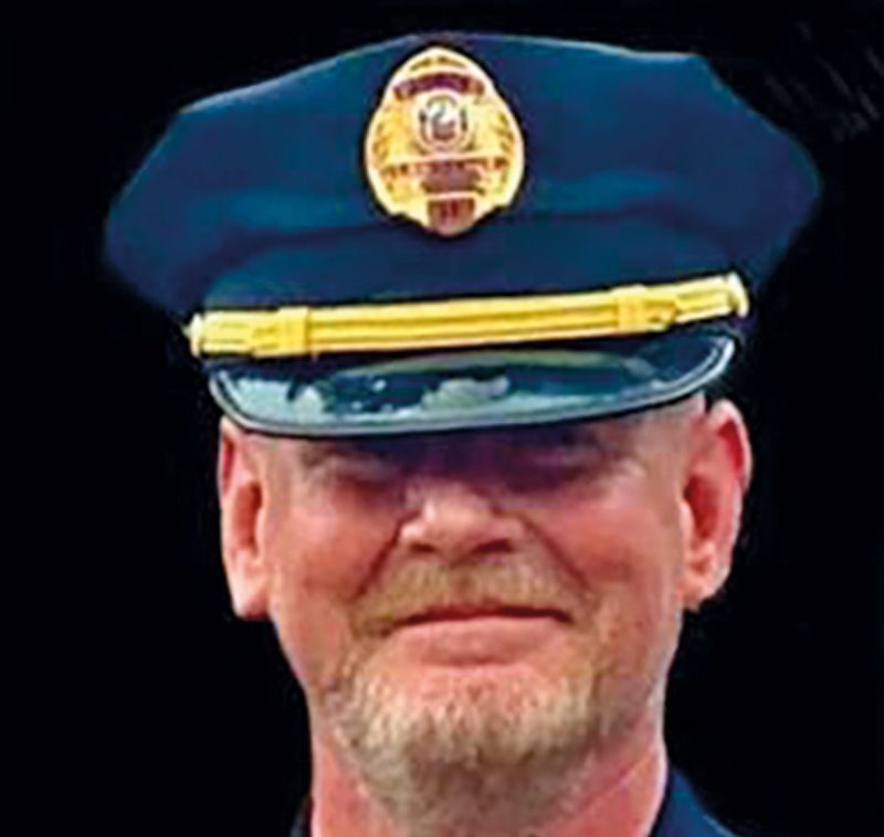 Capitan de Policía de Lawrence Michael Mangan