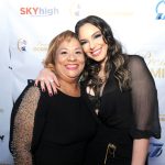 Hony Estrella junto a Milagros Marte