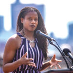 Boston City Councillor Lydia Edwards speaks at Piers Park in East Boston during the Environmental League of Massachusetts press conference to highlight the need to address climate change, create green jobs, and advance racial justice as Congress crafts a bold, robust infrastructure plan responsive to President Biden’s American Jobs Plan and American Families Plan.